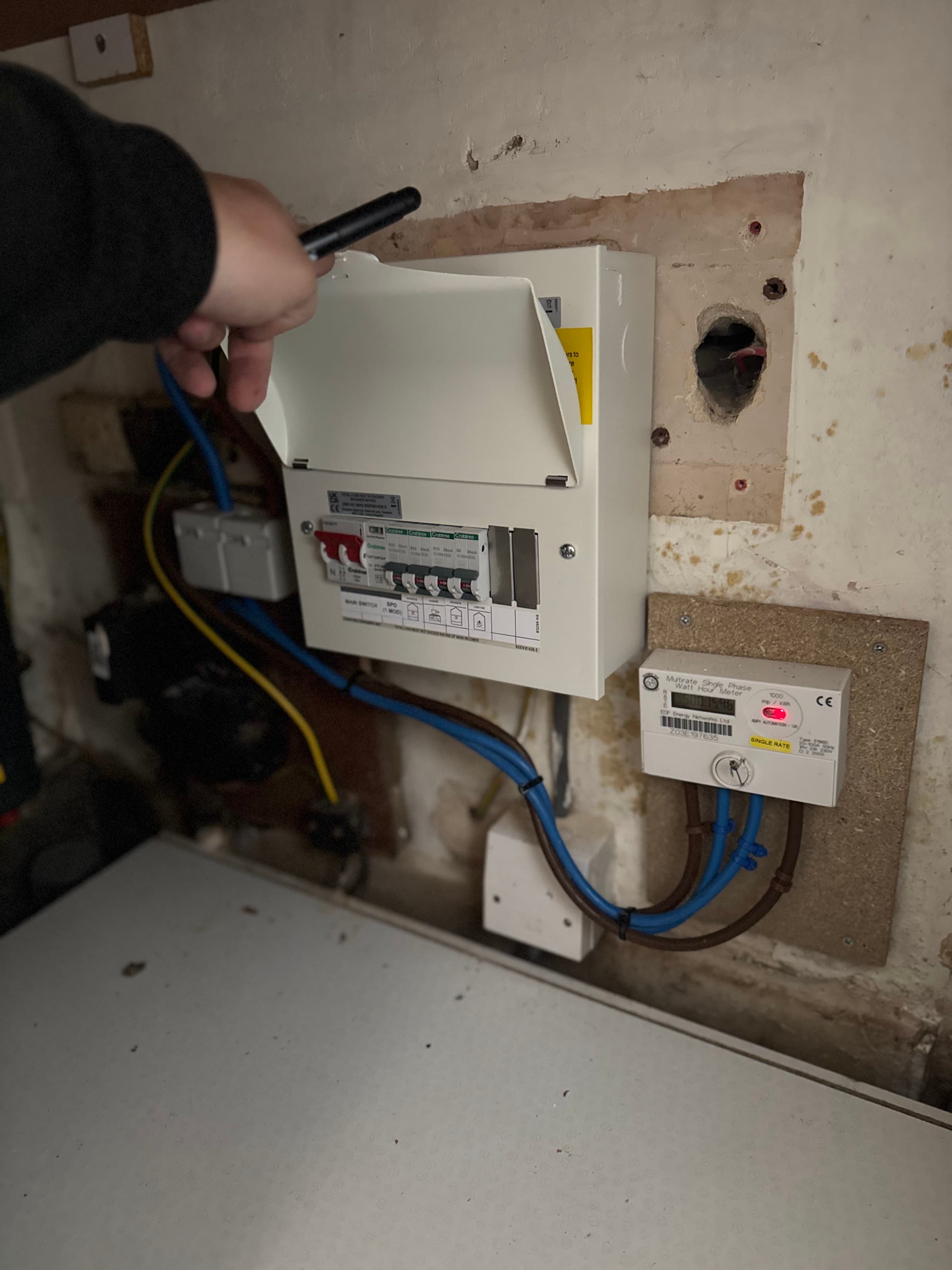 Consumer unit upgrade being checked by a Safeline electrician